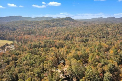 Welcome home to your new cabin nestled among trees backing up to on The Rock At Jocassee in South Carolina - for sale on GolfHomes.com, golf home, golf lot