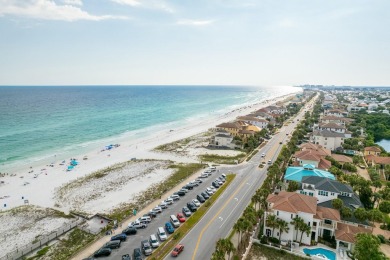 Experience coastal luxury at Sunshine Retreat nestled in the on Regatta Bay Golf and Country Club in Florida - for sale on GolfHomes.com, golf home, golf lot