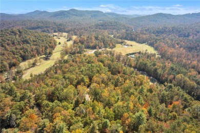 Welcome home to your new cabin nestled among trees backing up to on The Rock At Jocassee in South Carolina - for sale on GolfHomes.com, golf home, golf lot