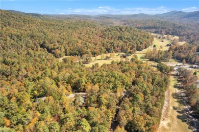 Welcome home to your new cabin nestled among trees backing up to on The Rock At Jocassee in South Carolina - for sale on GolfHomes.com, golf home, golf lot
