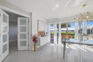 TOTALLY REMODELED First Floor Condo in a very active 55+ Golf on Leisureville Community Golf Course in Florida - for sale on GolfHomes.com, golf home, golf lot