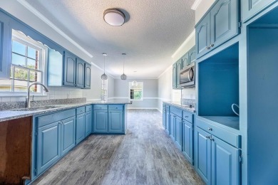 MAKE EVERY DAY A VACATION DAY! LOCATED IN SANTEE COOPER RESORT on Santee-Cooper Country Club in South Carolina - for sale on GolfHomes.com, golf home, golf lot