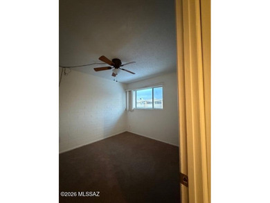 Charming 3-bedroom, 2-bath, two-story townhouse co-op located in on Randolph Park Golf Courses in Arizona - for sale on GolfHomes.com, golf home, golf lot