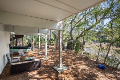 Discover coastal charm in this beautifully updated two-bedroom on The Seabrook Island Club in South Carolina - for sale on GolfHomes.com, golf home, golf lot