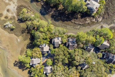 Discover coastal charm in this beautifully updated two-bedroom on The Seabrook Island Club in South Carolina - for sale on GolfHomes.com, golf home, golf lot