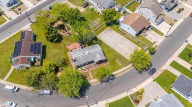 A rare offering, this traditional brick 4 bedroom, 2 bath home on The Links At Brigantine Beach in New Jersey - for sale on GolfHomes.com, golf home, golf lot