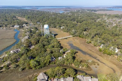 Discover coastal charm in this beautifully updated two-bedroom on The Seabrook Island Club in South Carolina - for sale on GolfHomes.com, golf home, golf lot