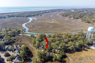 Discover coastal charm in this beautifully updated two-bedroom on The Seabrook Island Club in South Carolina - for sale on GolfHomes.com, golf home, golf lot