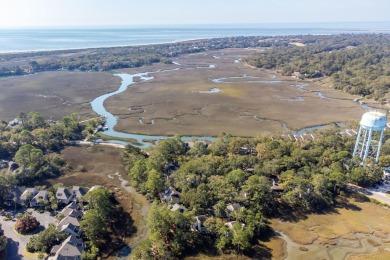 Discover coastal charm in this beautifully updated two-bedroom on The Seabrook Island Club in South Carolina - for sale on GolfHomes.com, golf home, golf lot