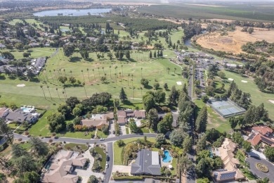 Enjoy this exceptionally updated home just steps from the San on San Joaquin Country Club in California - for sale on GolfHomes.com, golf home, golf lot