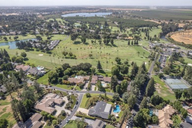 Enjoy this exceptionally updated home just steps from the San on San Joaquin Country Club in California - for sale on GolfHomes.com, golf home, golf lot