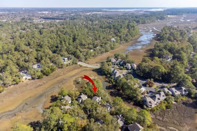 Discover coastal charm in this beautifully updated two-bedroom on The Seabrook Island Club in South Carolina - for sale on GolfHomes.com, golf home, golf lot