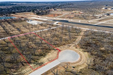 Located on a quiet cut-de-sac in the highly sought after on Pecan Plantation Country Club in Texas - for sale on GolfHomes.com, golf home, golf lot