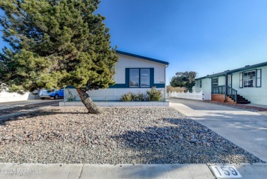 Welcome to this fully furnished, well-maintained double wide on Quail Wood Greens Golf Course in Arizona - for sale on GolfHomes.com, golf home, golf lot