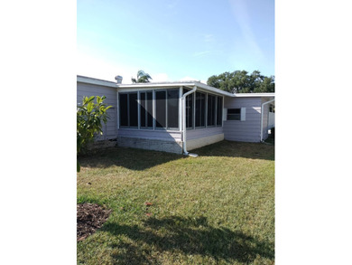 Don't miss this single-wide home in the popular Hidden Golf a on Lake Henry Golf Club in Florida - for sale on GolfHomes.com, golf home, golf lot