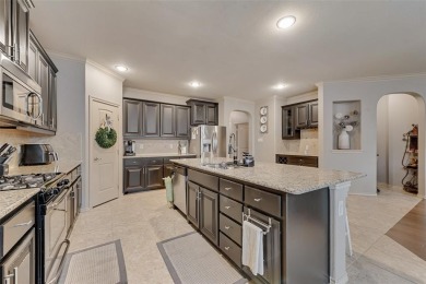 Step into this beautifully maintained showcase home, where on The Golf Club At Champions Circle in Texas - for sale on GolfHomes.com, golf home, golf lot
