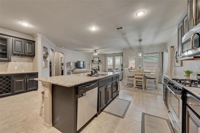 Step into this beautifully maintained showcase home, where on The Golf Club At Champions Circle in Texas - for sale on GolfHomes.com, golf home, golf lot