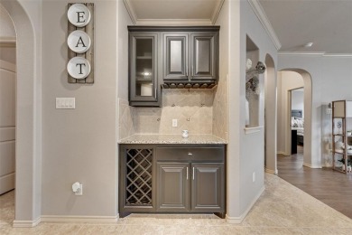 Step into this beautifully maintained showcase home, where on The Golf Club At Champions Circle in Texas - for sale on GolfHomes.com, golf home, golf lot
