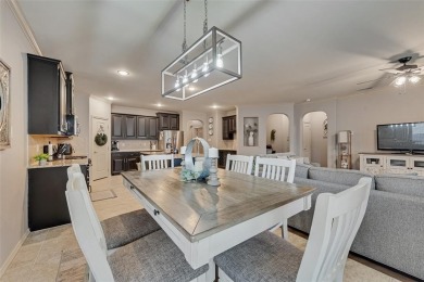 Step into this beautifully maintained showcase home, where on The Golf Club At Champions Circle in Texas - for sale on GolfHomes.com, golf home, golf lot