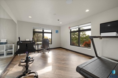 Luxury Living on Red Rocks Golf Course Modern elegance meets on Golf Club At Red Rock in South Dakota - for sale on GolfHomes.com, golf home, golf lot