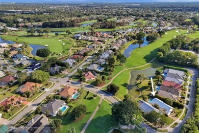 Located in prestigious Boca Woods Country Club this home is move on Boca Woods Country Club in Florida - for sale on GolfHomes.com, golf home, golf lot