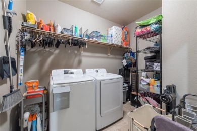 Step into this beautifully maintained showcase home, where on The Golf Club At Champions Circle in Texas - for sale on GolfHomes.com, golf home, golf lot