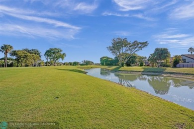 Located in prestigious Boca Woods Country Club this home is move on Boca Woods Country Club in Florida - for sale on GolfHomes.com, golf home, golf lot