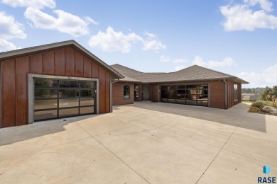Luxury Living on Red Rocks Golf Course Modern elegance meets on Golf Club At Red Rock in South Dakota - for sale on GolfHomes.com, golf home, golf lot