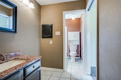 Located in the heart of Plano, this charming Tudor-style on The Courses at Watters Creek in Texas - for sale on GolfHomes.com, golf home, golf lot