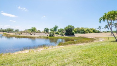 Awesome view across a large lake to the golf course from this on Legends Golf and Country Club in Florida - for sale on GolfHomes.com, golf home, golf lot