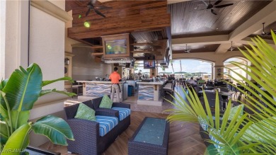 Awesome view across a large lake to the golf course from this on Legends Golf and Country Club in Florida - for sale on GolfHomes.com, golf home, golf lot