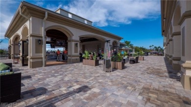 Awesome view across a large lake to the golf course from this on Legends Golf and Country Club in Florida - for sale on GolfHomes.com, golf home, golf lot
