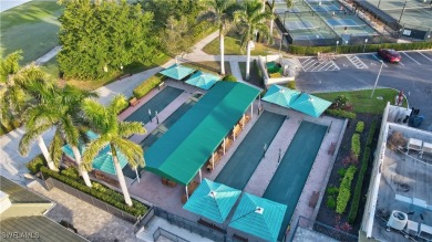 Awesome view across a large lake to the golf course from this on Legends Golf and Country Club in Florida - for sale on GolfHomes.com, golf home, golf lot