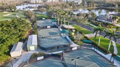 Awesome view across a large lake to the golf course from this on Legends Golf and Country Club in Florida - for sale on GolfHomes.com, golf home, golf lot