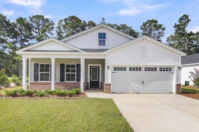 Enjoy a great view of your friends and neighbors as they tee off on Players Course At Wyboo Plantation in South Carolina - for sale on GolfHomes.com, golf home, golf lot