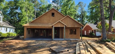 Act now to secure this stunning new-build ranch in Chapel Creek on Santee National Golf Course in South Carolina - for sale on GolfHomes.com, golf home, golf lot