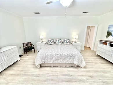 Situated on nearly half an acre, this remarkable waterfront on Sandestin Golf and Beach Resort - Raven in Florida - for sale on GolfHomes.com, golf home, golf lot