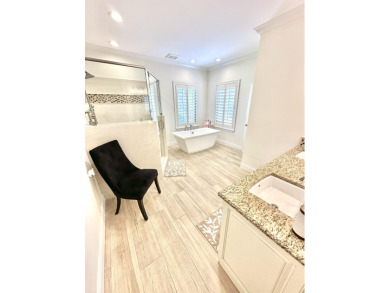 Situated on nearly half an acre, this remarkable waterfront on Sandestin Golf and Beach Resort - Raven in Florida - for sale on GolfHomes.com, golf home, golf lot