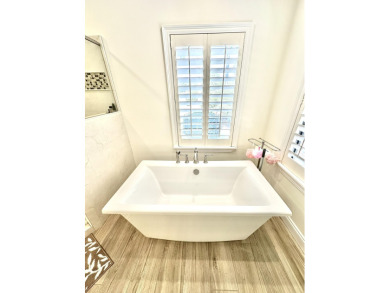 Situated on nearly half an acre, this remarkable waterfront on Sandestin Golf and Beach Resort - Raven in Florida - for sale on GolfHomes.com, golf home, golf lot