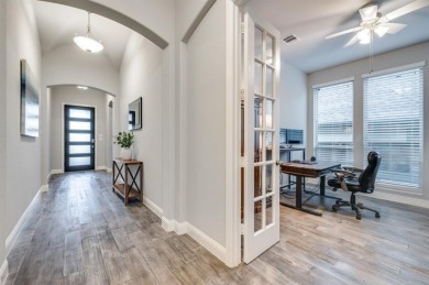 This American Legend built one story ranch home with backyard on The Tribute At the Colony in Texas - for sale on GolfHomes.com, golf home, golf lot