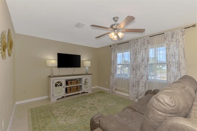 Coastal comfort meets smart design in this beautifully on Jacaranda West Country Club in Florida - for sale on GolfHomes.com, golf home, golf lot