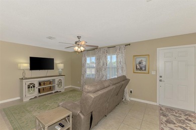 Coastal comfort meets smart design in this beautifully on Jacaranda West Country Club in Florida - for sale on GolfHomes.com, golf home, golf lot