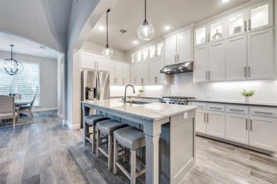 This American Legend built one story ranch home with backyard on The Tribute At the Colony in Texas - for sale on GolfHomes.com, golf home, golf lot