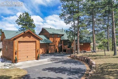 Exquisite log sided home on the 7th fairway of the golf course! on Shining Mountain Golf Club in Colorado - for sale on GolfHomes.com, golf home, golf lot