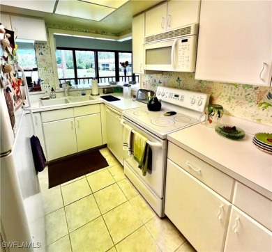NEW GREAT PRICE ***BEAUTIFUL PICTURESQUE VIEWS CONDO...(NEW AC on Hideaway Country Club in Florida - for sale on GolfHomes.com, golf home, golf lot