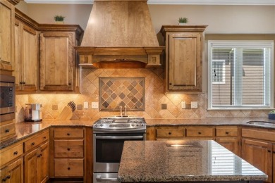 Perfectly situated on a premier golf course lot, this reverse 1 on Staley Farms Golf Club in Missouri - for sale on GolfHomes.com, golf home, golf lot
