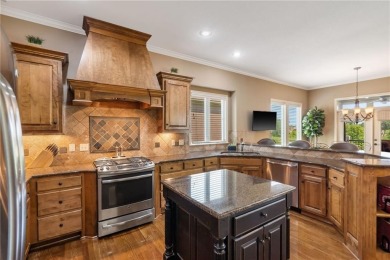 Perfectly situated on a premier golf course lot, this reverse 1 on Staley Farms Golf Club in Missouri - for sale on GolfHomes.com, golf home, golf lot