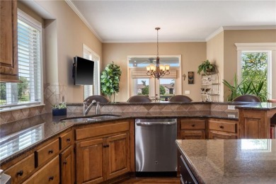 Perfectly situated on a premier golf course lot, this reverse 1 on Staley Farms Golf Club in Missouri - for sale on GolfHomes.com, golf home, golf lot