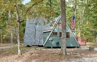 Escape to your own secluded wooded retreat! This completely on Innsbrook Resort Golf Course in Missouri - for sale on GolfHomes.com, golf home, golf lot