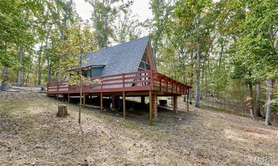 Escape to your own secluded wooded retreat! This completely on Innsbrook Resort Golf Course in Missouri - for sale on GolfHomes.com, golf home, golf lot